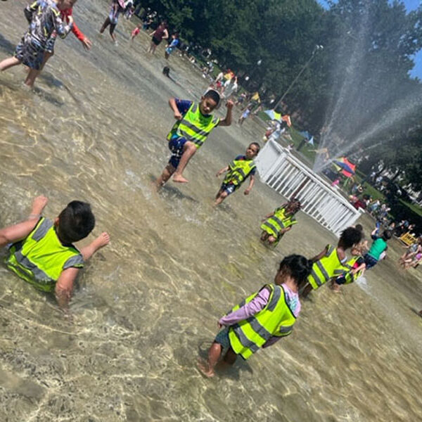 Sprinkler Fun at TOP TOTS Learning Center - in the Brookline Neighborhood