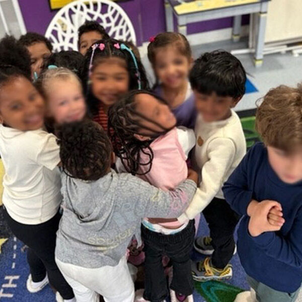 Group Hug at TOP TOTS Learning Center in Brookline MA