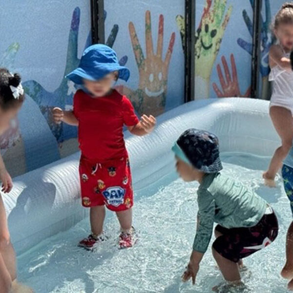 Swimming at TOP TOTS Learning Center located in Brookline MA